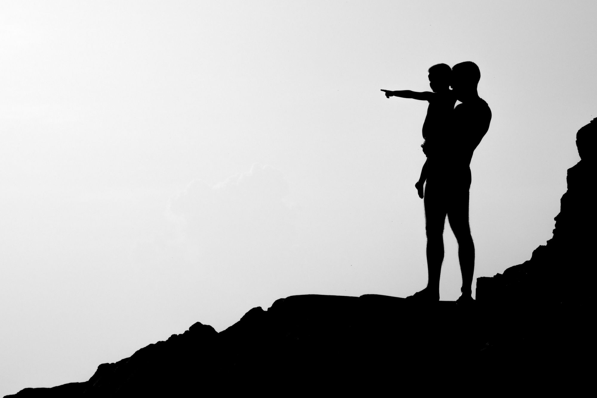 Black and white image of father and son